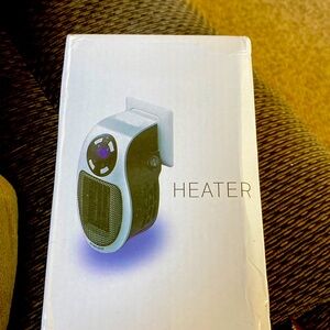 Alpha heater Small plug 🔌 in heater. New in box.